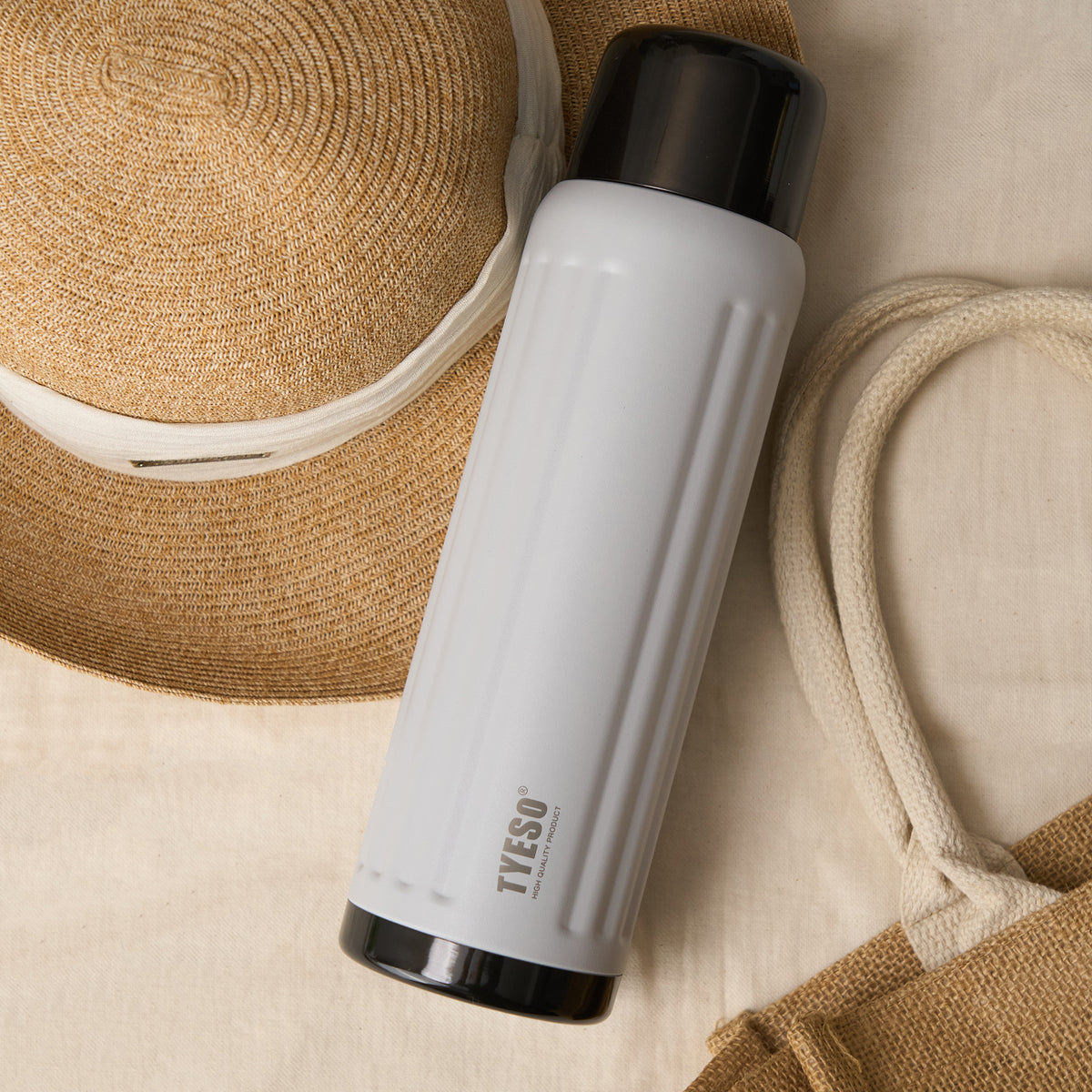 Light Gray FLUTE insulated bottle packed for travel #color_light gray
