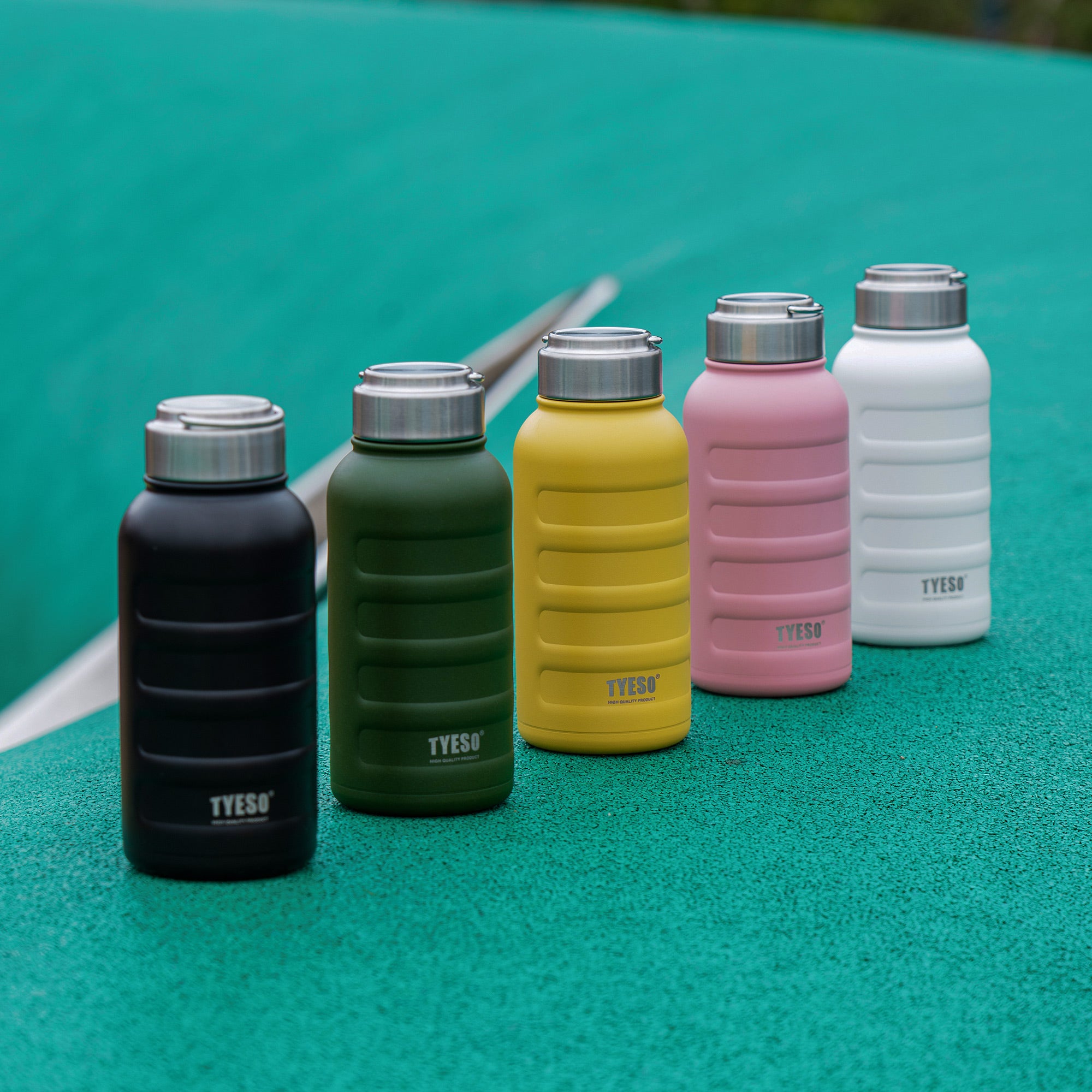 TYESO ASCENT Portable Sports Bottle with lovely shape in White – carry handle detail #color_white