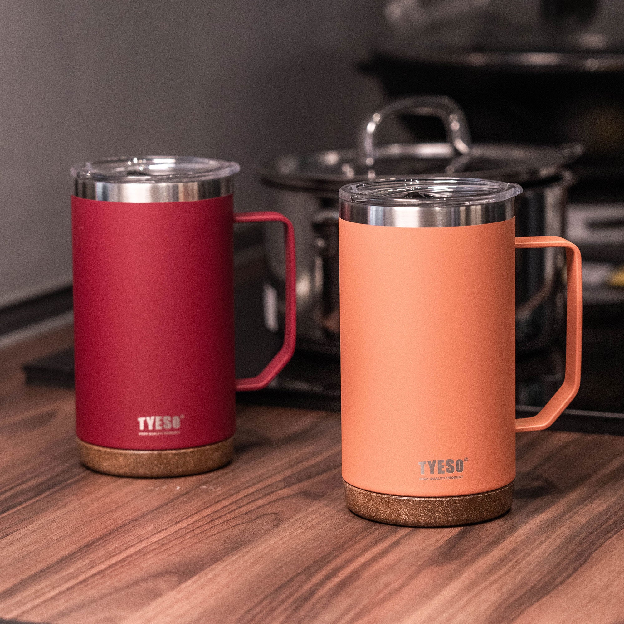 Orange and red TYESO CASK coffee mugs in a warm kitchen setting #color_orange